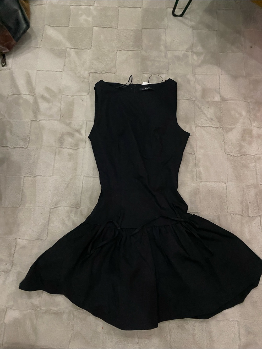 Sleeveless Black Mini Dress with Flared Skirt